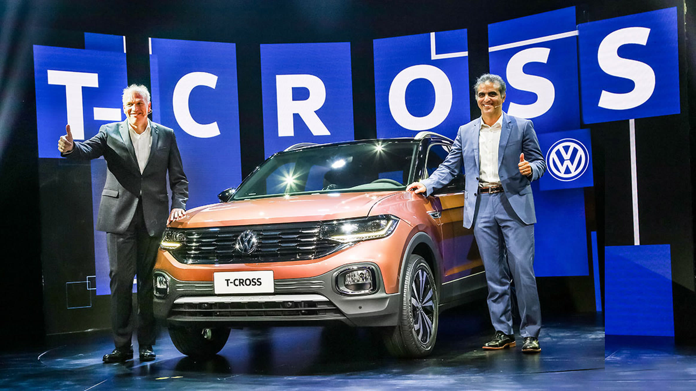 T-Cross launch, T-CROSS letter backdrop with presenters